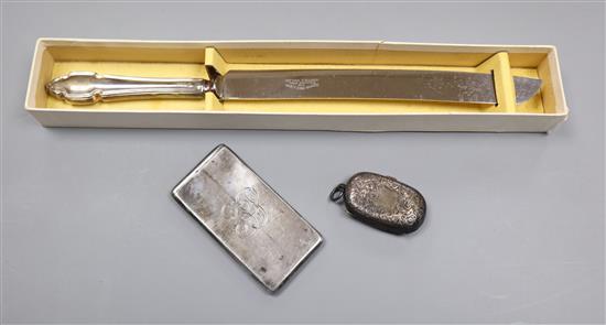 A silver calling card case, a silver sovereign / half sovereign case and a silver handled bread knife (3)